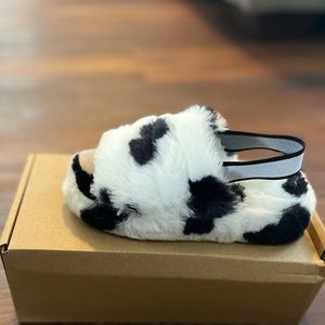 Cow print kid slides